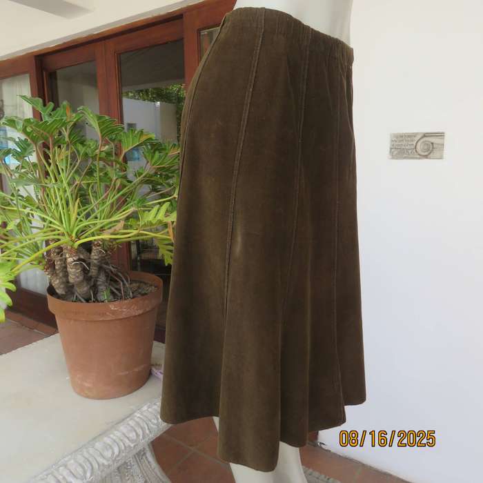 Choc brown a-line paneled corduroy skirt with elasticated waist. Size 42