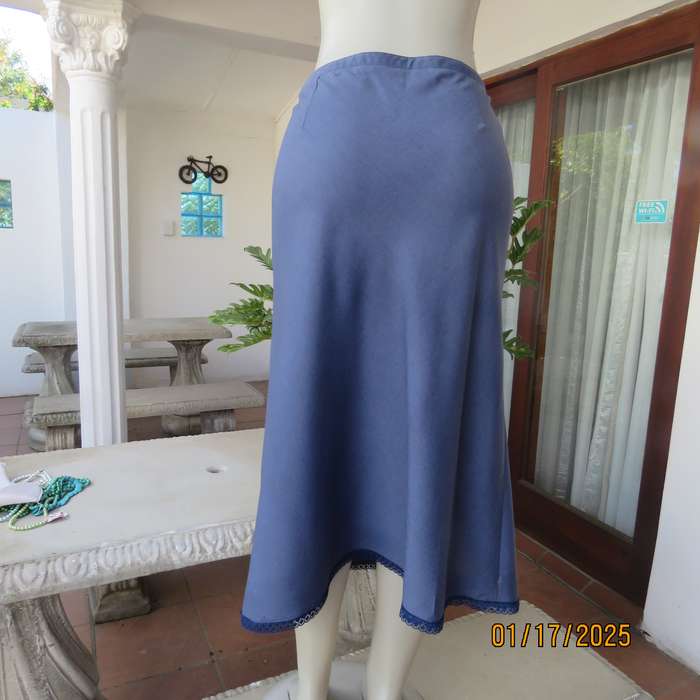 WOOLWORTHS airforce blue A-line skirt with zip at side. Size 38.Lace hemline.Poly-viscose blend.
