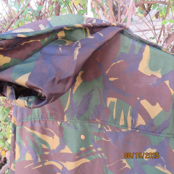 ARMY Co long camo rain jacket with hood and drawstrings. Size 3XL.