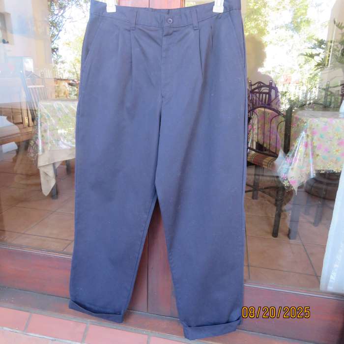 Dark navy pure cotton men's pants with tapered legs and turnovers. Size 36