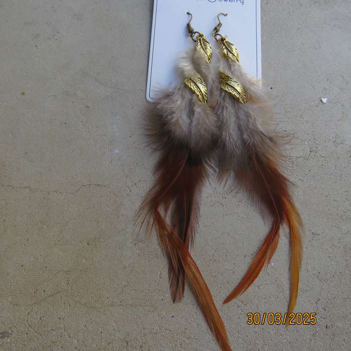 Extra long brownish feather and gold ethnic earrings. New item.
