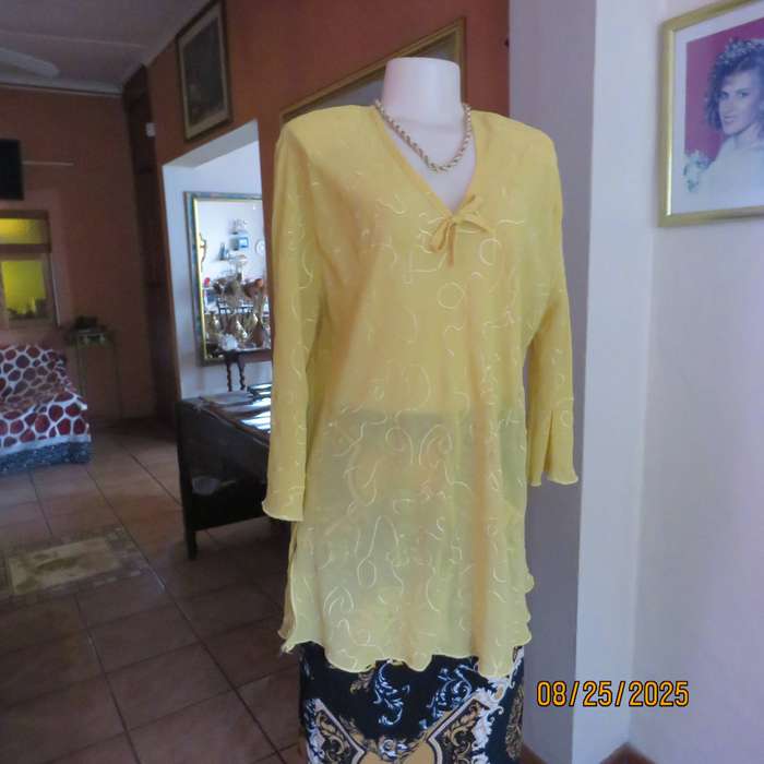 Golden yellow slightly creased embroidered polyester long top. Size 40