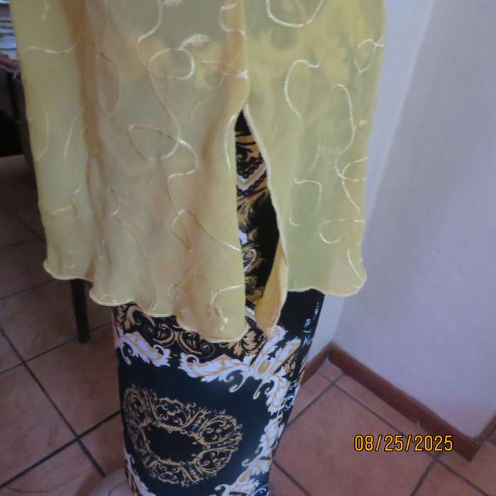 Golden yellow slightly creased embroidered polyester long top. Size 40