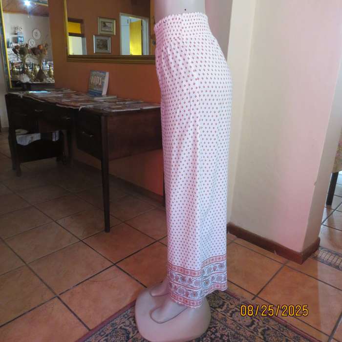 REAL Woman viscose wide legged cream pants with diamond pattern and border. Size 34