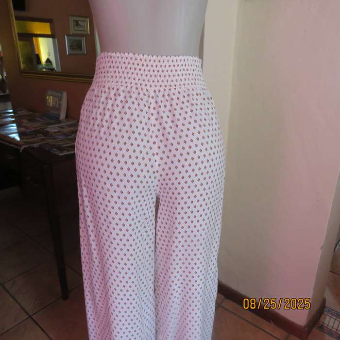 REAL Woman viscose wide legged cream pants with diamond pattern and border. Size 34