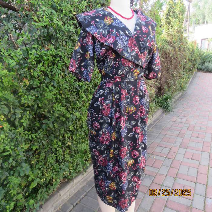 GEORGE R black rayon dress with blue-red-yellow floral print. Size 36