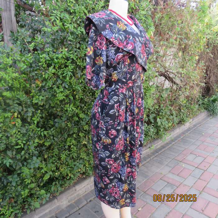 GEORGE R black rayon dress with blue-red-yellow floral print. Size 36