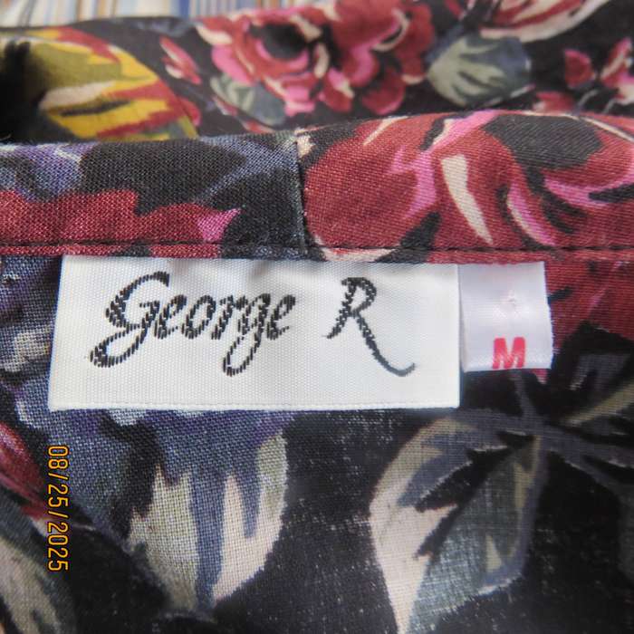 GEORGE R black rayon dress with blue-red-yellow floral print. Size 36