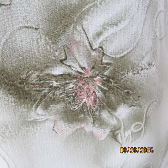 Pale green with green-pink floral print twinset in soft polyester. Size 37