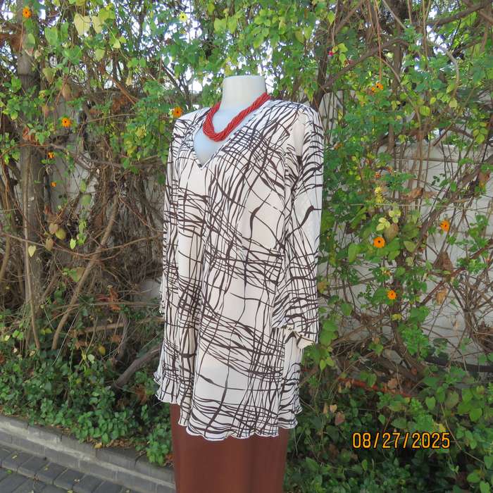 DONNA Claire rich cream slip over V neck top with brown graphic print. Size 48