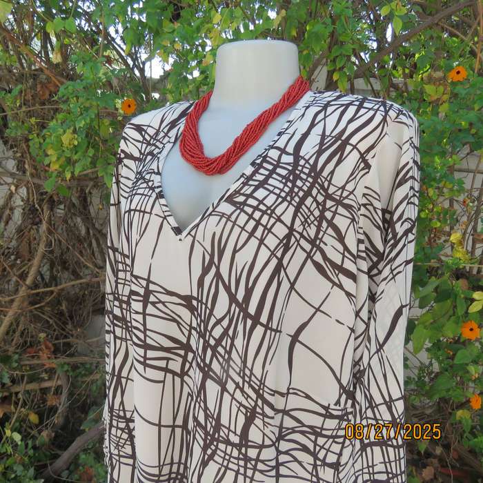 DONNA Claire rich cream slip over V neck top with brown graphic print. Size 48