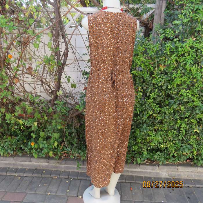 Caramel ankle length shift dress with black-white tiny circles. Size 36
