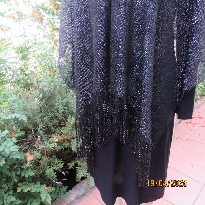 Luxury black polyester throw with silver thread with V front. New item