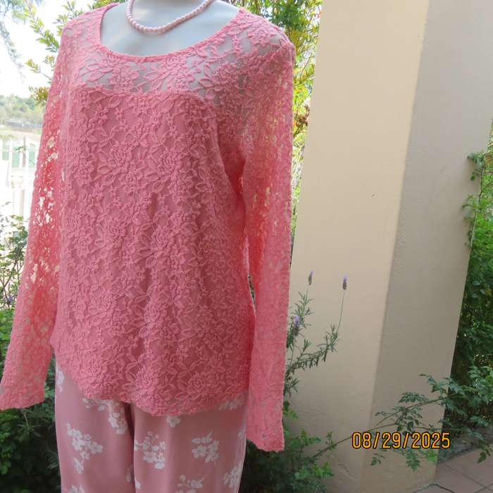 Salmon pink nylon floral lace long sleeve top with polyester stretch front lining. Size 38-40