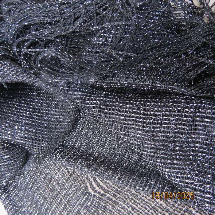 Luxury black polyester throw with silver thread with V front. New item