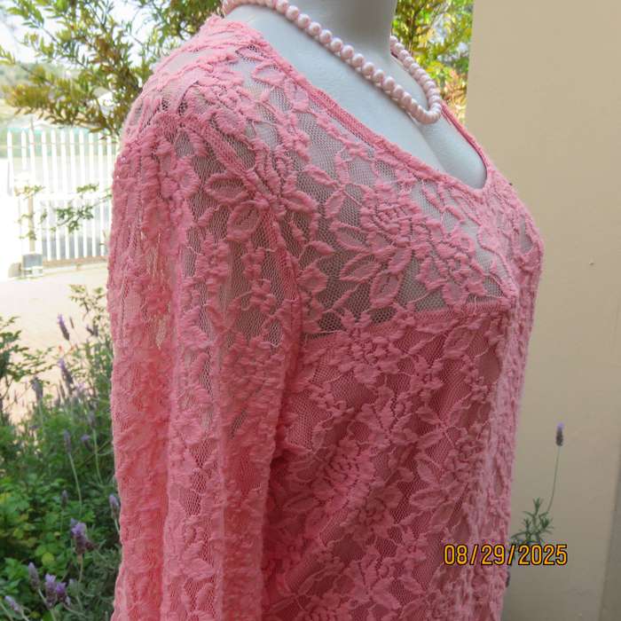 Salmon pink nylon floral lace long sleeve top with polyester stretch front lining. Size 38-40