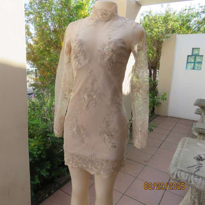 Gold colour richly embroidered mini dress in satin and sheer fabric. Size 30-32