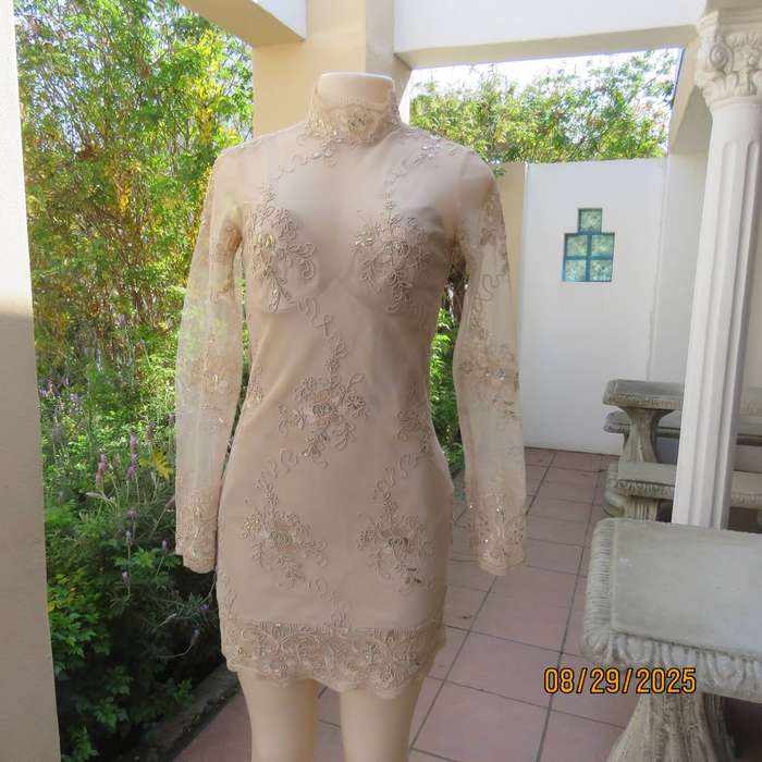 Gold colour richly embroidered mini dress in satin and sheer fabric. Size 30-32