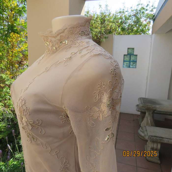 Gold colour richly embroidered mini dress in satin and sheer fabric. Size 30-32