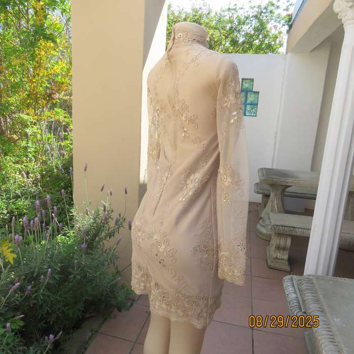 Gold colour richly embroidered mini dress in satin and sheer fabric. Size 30-32