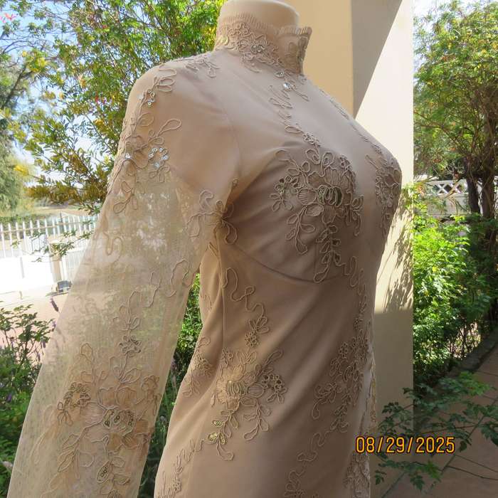 Gold colour richly embroidered mini dress in satin and sheer fabric. Size 30-32