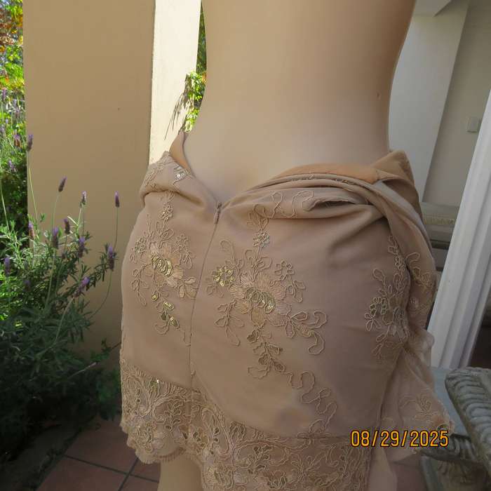 Gold colour richly embroidered mini dress in satin and sheer fabric. Size 30-32