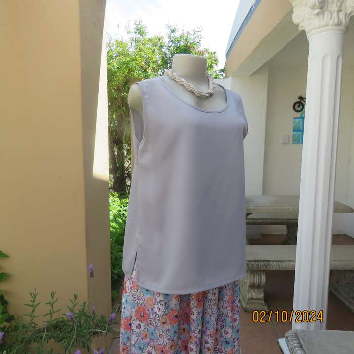 Owner made dusty lilac sleeveless cami style slip over polyester top. Size 36. As new
