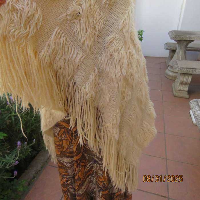 Rich cream acrylic knit soft throw over poncho with fluffy patches. Size 32 to 38