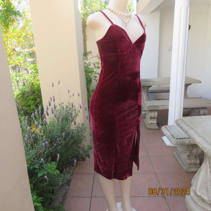 Red plum strappy dress in stretch polyester velvet with V bustline. Size 34.