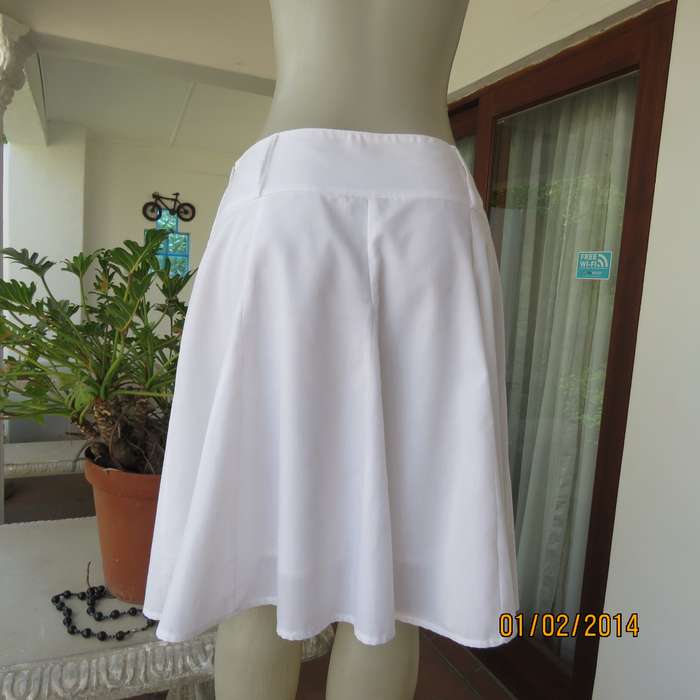 As new white gored skirt with wide yoked waistband.Zip at size. Size 36 by IMAGE.2Layers polycotton.