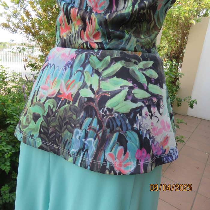 H&M slip over cheerful floral printed sleeves polyester stretch peplum top. Size 38