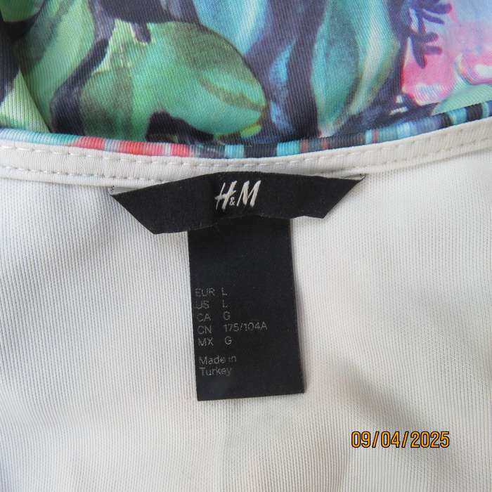 H&M slip over cheerful floral printed sleeves polyester stretch peplum top. Size 38