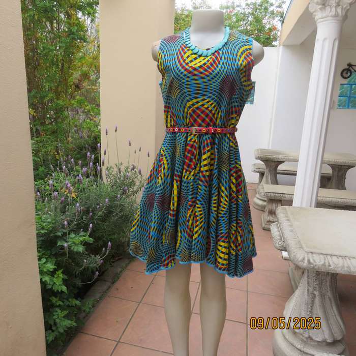 Colourful geometric printed flare sleeveless dress. Zip at back. Size 34