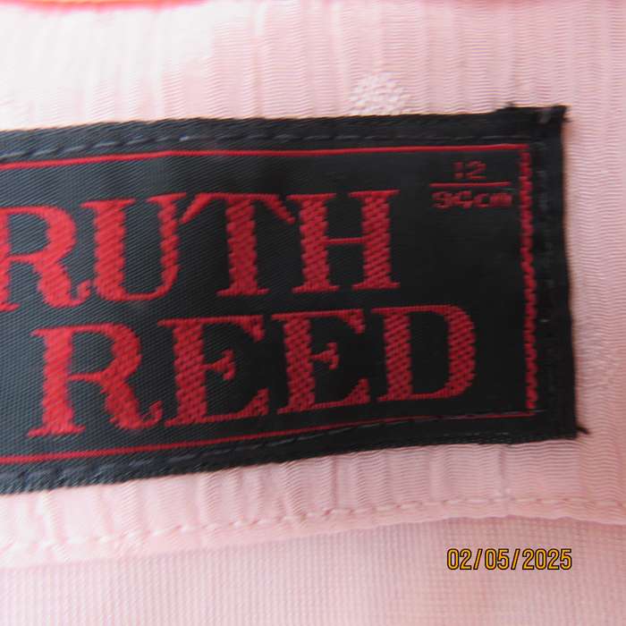 RUTH REED luxury permanent pleated polyester embossed size 38 top.