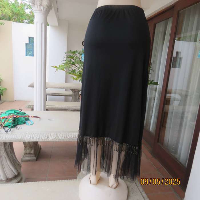 Black stretch polyester ankle length skirt with elastic waist. Netting and beads. Size 36