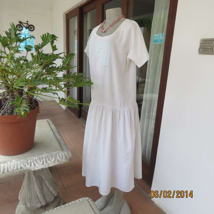 Typical 80's boutique made boutique made dropped waist appliqued dress .Natural colour.Size 36