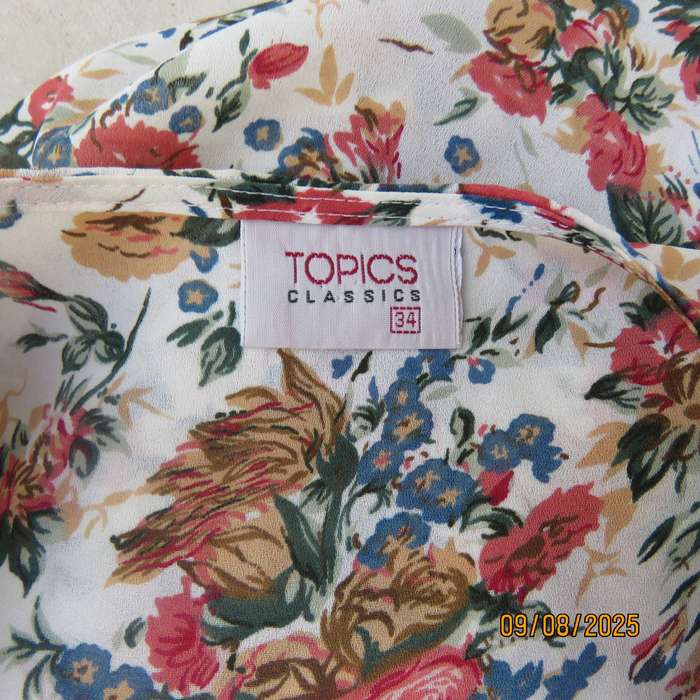 TOPICS cream silky polyester top with floral posies and short sleeves. Size 34-36