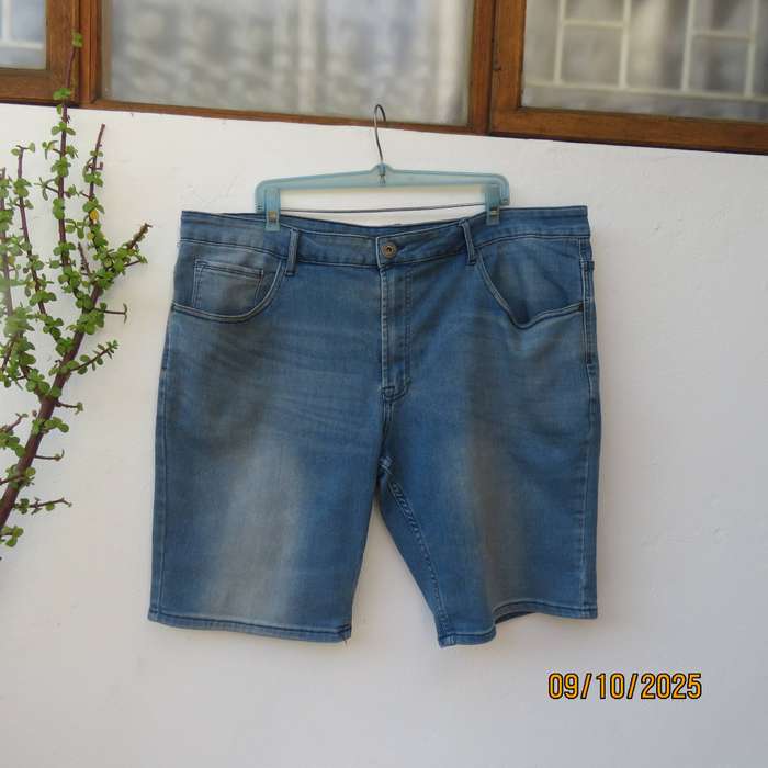 Blue denim polycotton stretch jean shorts in size 42. Decent leg length.