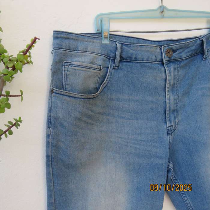 Blue denim polycotton stretch jean shorts in size 42. Decent leg length.