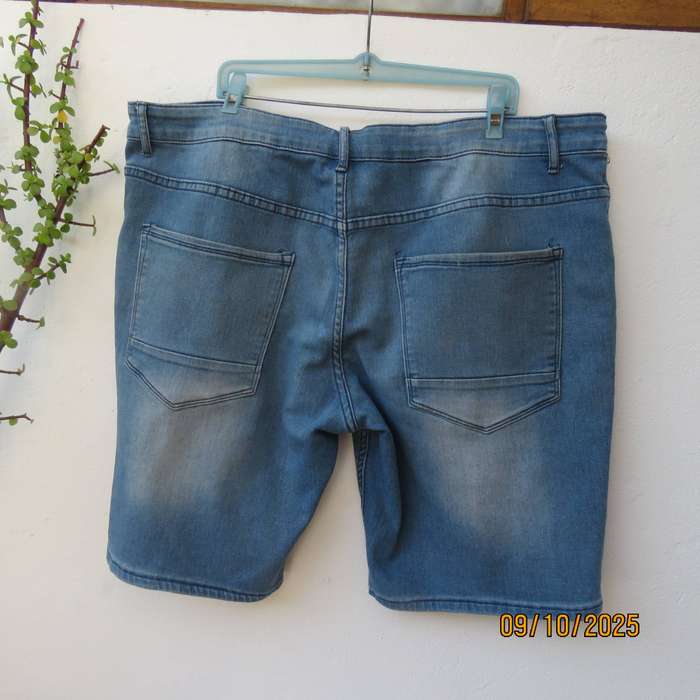 Blue denim polycotton stretch jean shorts in size 42. Decent leg length.