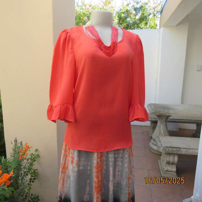 Crimson slip over crinkled polyester size 34 top by OR. Frilled sleeves.