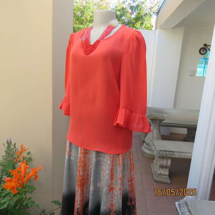 Crimson slip over crinkled polyester size 34 top by OR. Frilled sleeves.