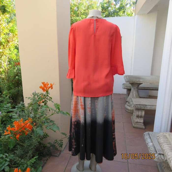 Crimson slip over crinkled polyester size 34 top by OR. Frilled sleeves.