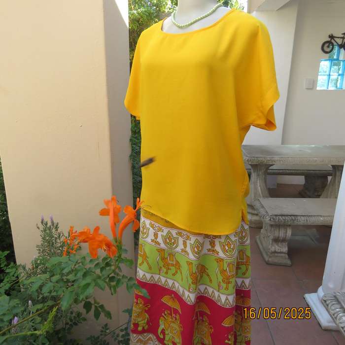 Butterscotch yellow polyester slip over size 38 top. Tiny cut-on sleeves.