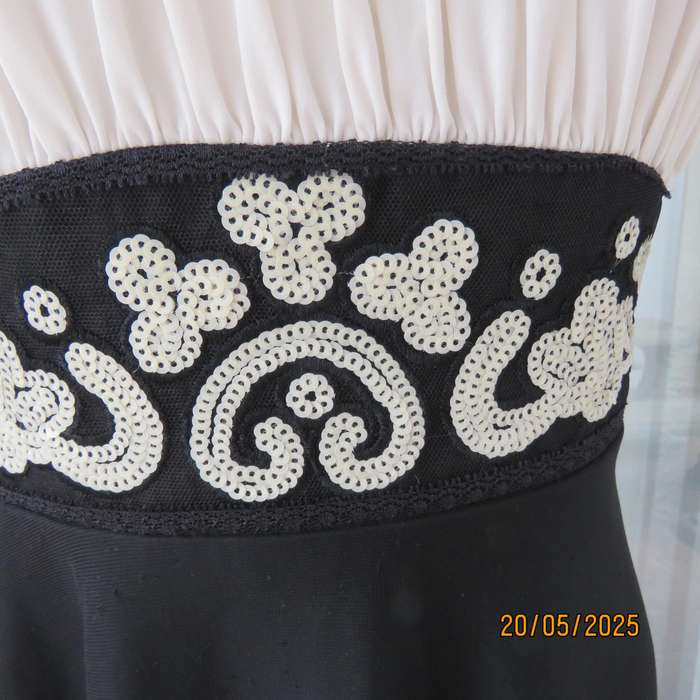 FOSHINI evening strappy dress in black with white sequins and white gathered bust area. Size 36