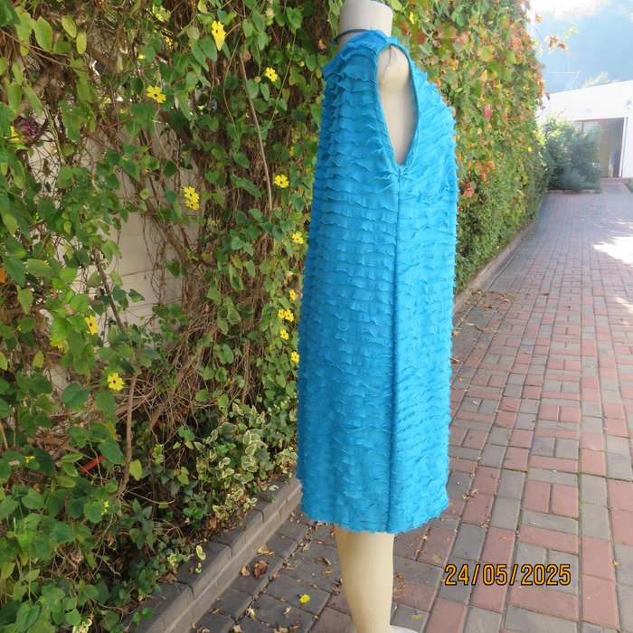 Jade colour sleeveless dress with sheer polyester coat. Boutique made size 40.