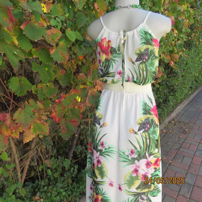 Ankle length long white sheer polyester cheerful floral strappy dress. Lined. Size 32.