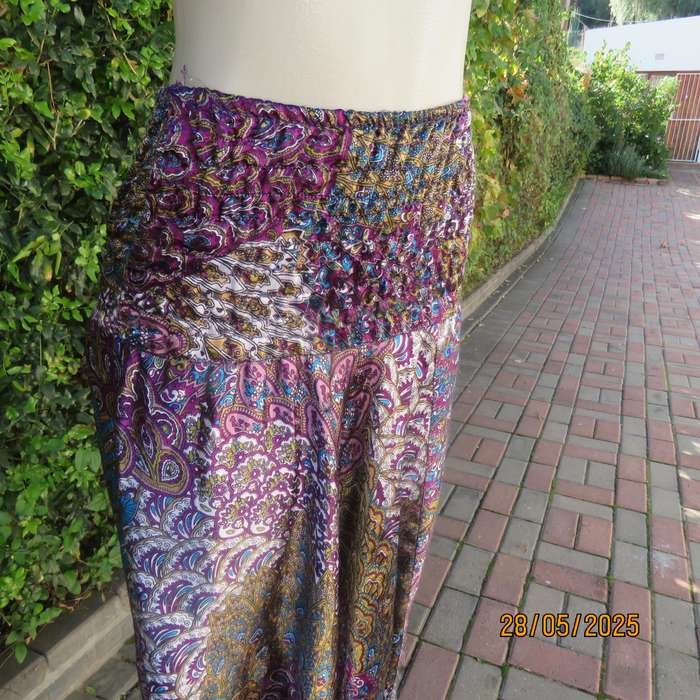 Harem pants in jewel colours with peacock feather patterns. Silky poly-rayon. Size 34-36.