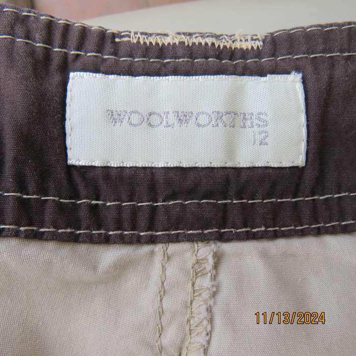 WOOLWORTHS beige knee length shorts size 36. Pockets back and front.100% cotton. As new cond.
