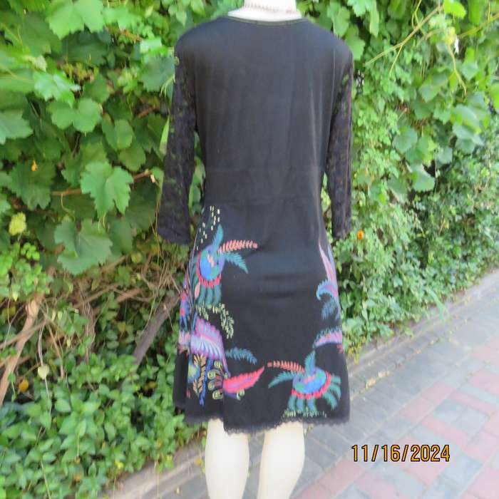Smart casual black stretch polycotton slip over dress. Lace sleeves. Size 36-38. Jewel colour print.